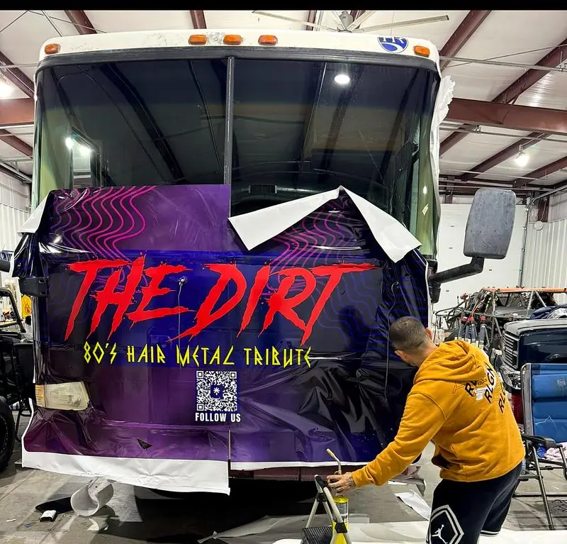 Commercial bus wrap installation for The Dirt band