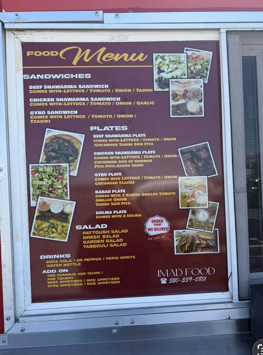 Installed menu board signage for IMAD Food truck window